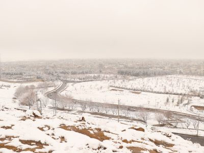 نمای برفی زمستان خمین از کوه بوجه